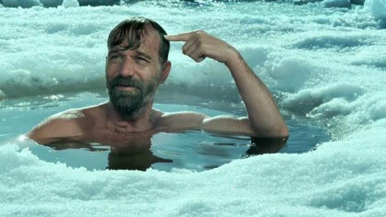 Image of Wim Hof flexing.